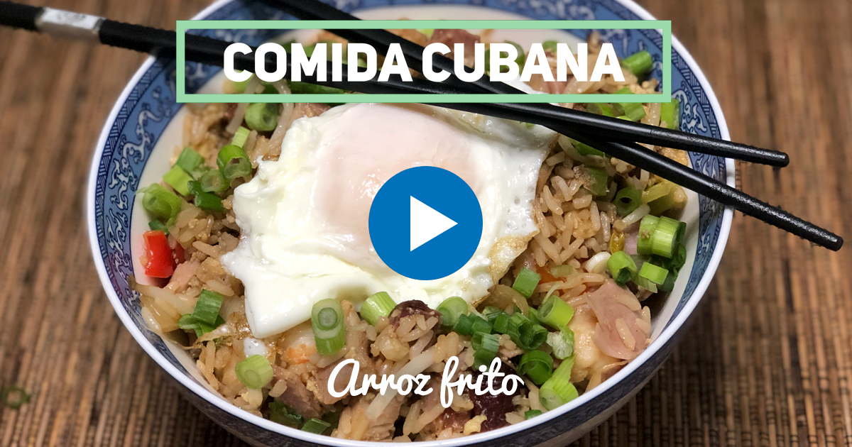Close-up of Cuban fried rice with soy sauce and fresh herbs