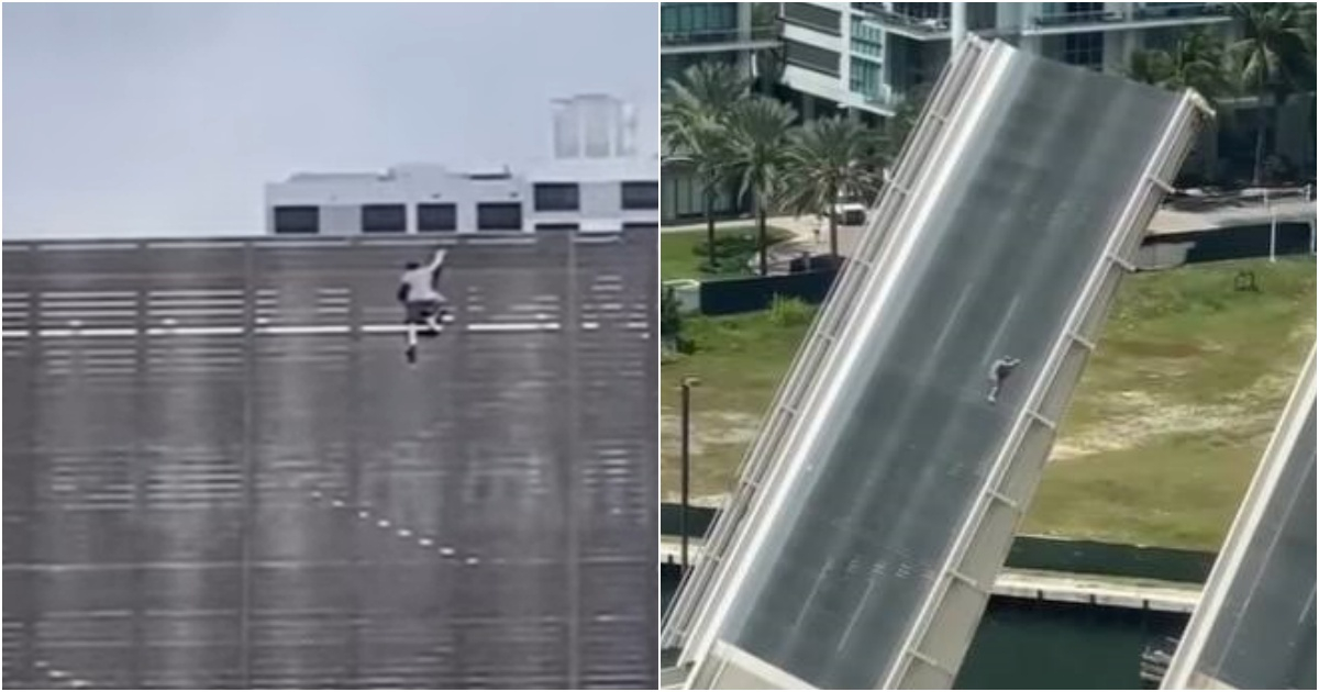 Hombre escala puente levadizo de Brickell Avenue en Miami